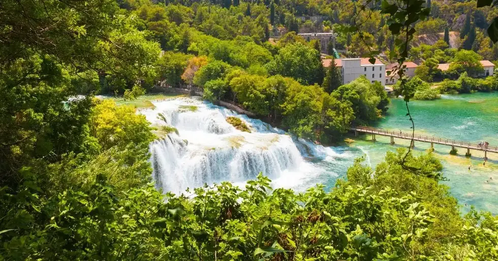 Panoramic tour boat on the green Krka river canyon on the budget Krka waterfalls and Primošten day trip from Split